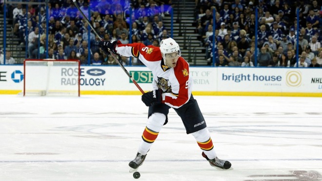 Florida Panthers' defenseman Aaron Ekblad (5) takes a shot against the Tampa Bay Lightning during the third period at Amalie Arena. (Kim Klement-USA TODAY Sports)